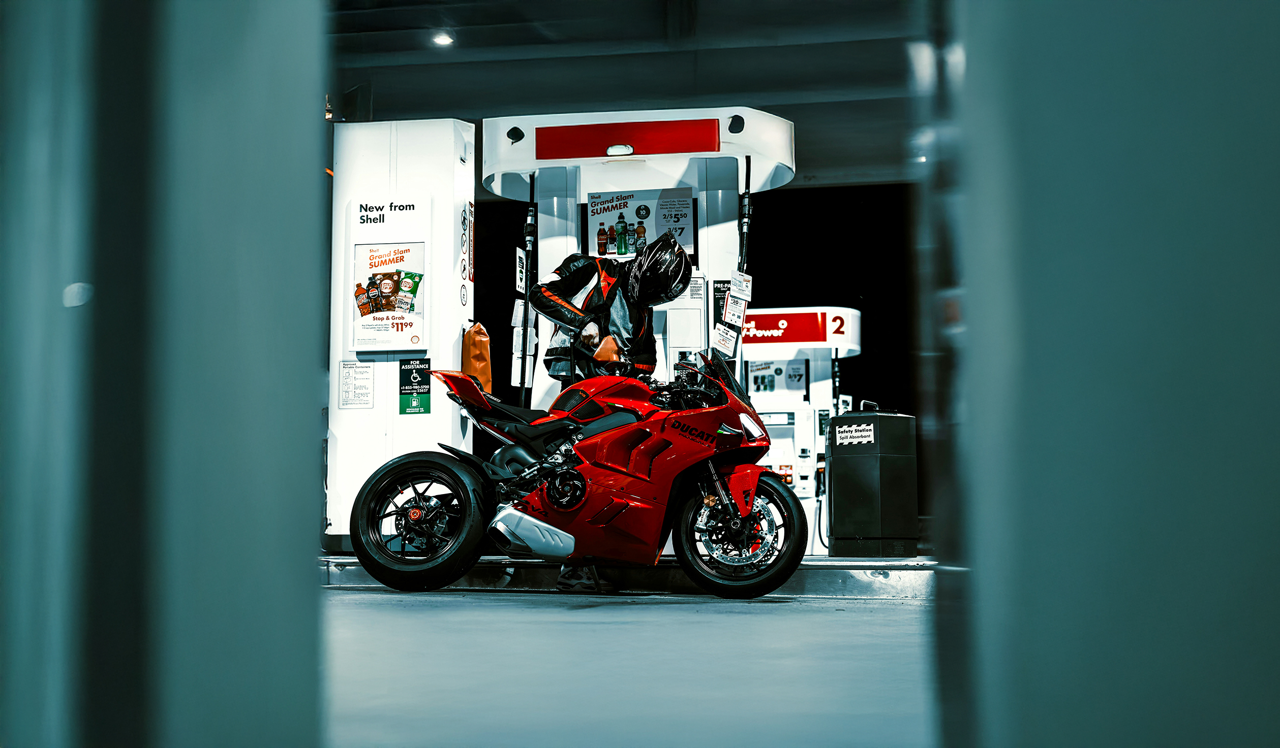 Guy Filling up his bike